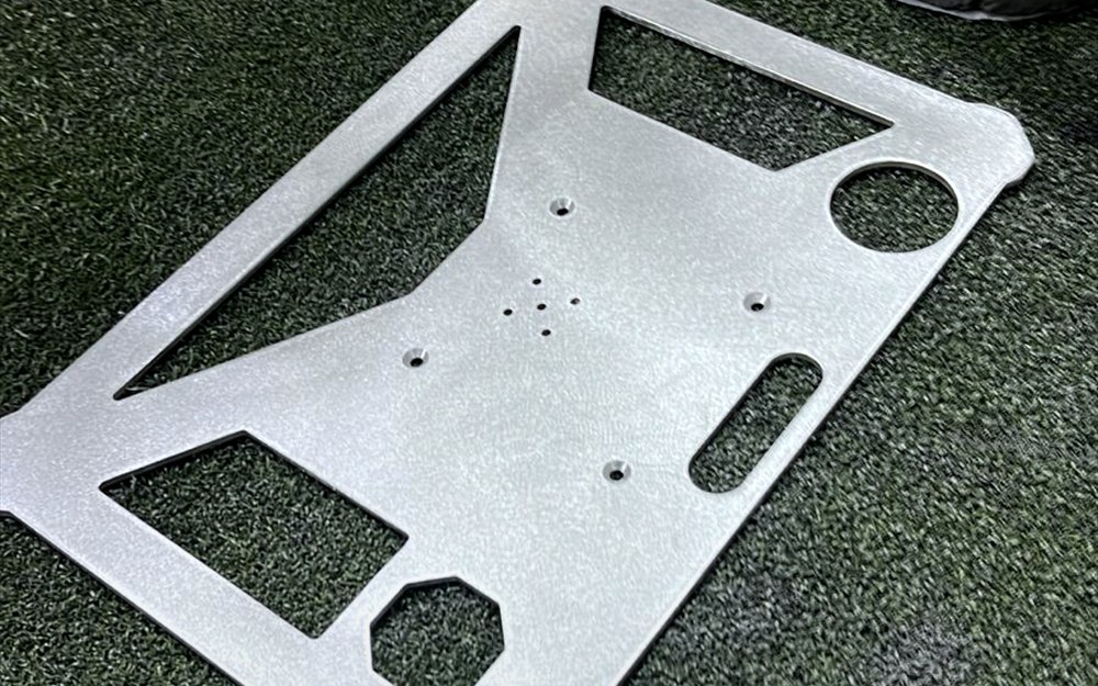 Laser-cut project component in the workshop