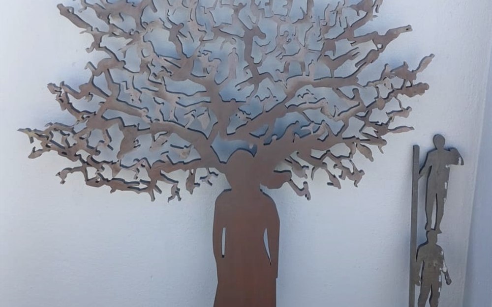 Decorative laser-cut metal tree panel
